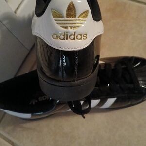 Adidas Black and White Shoes with Gold Logo